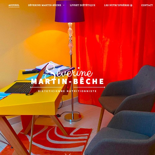 Screenshot of a website with colourful desk and armchair